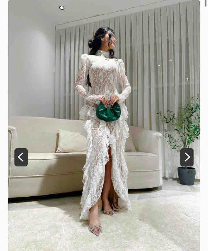 فستان ابيض المصممه زمردا